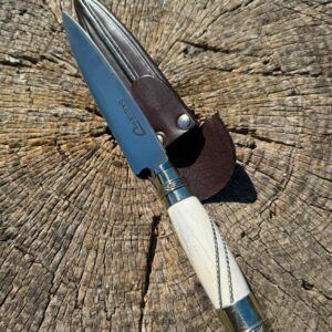 Cuchilleria Artesanal con Cabo de canilla de vaca, con conos y doble filetes trenzados de alpaca